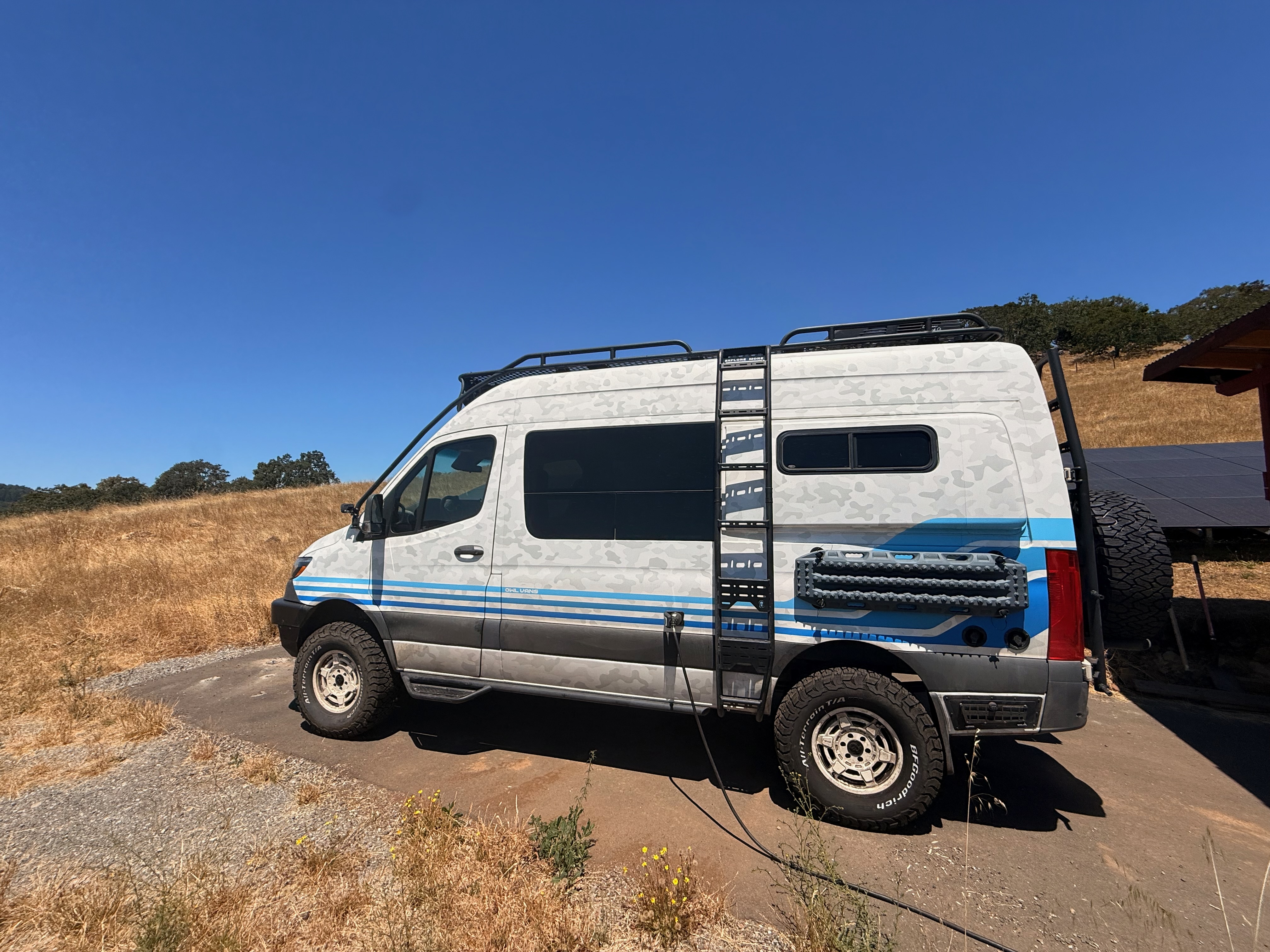 Current driver-side view of the 2021 Storyteller Overland Stealth Sprinter